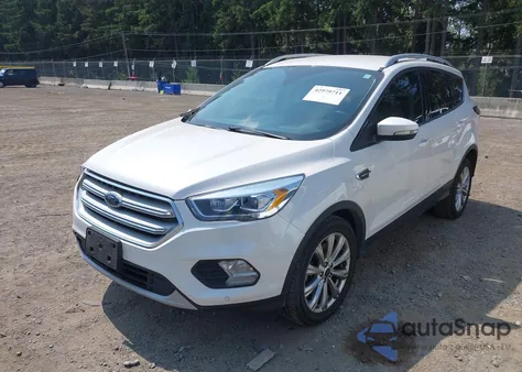 2018 Ford Escape Titanium из США, поврежденный, VIN 1FMCU9J95JUC89725